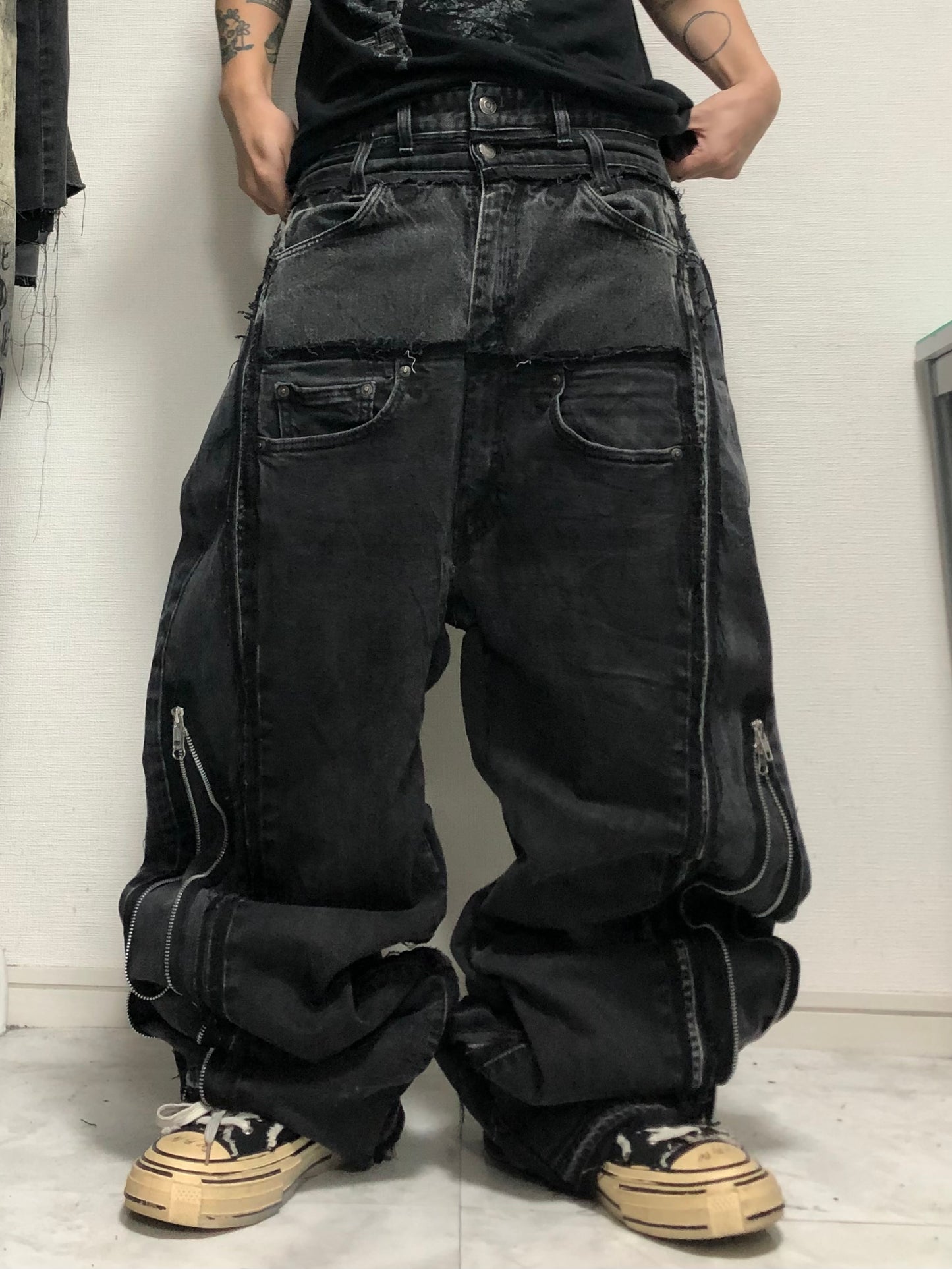 double posting black denim pants