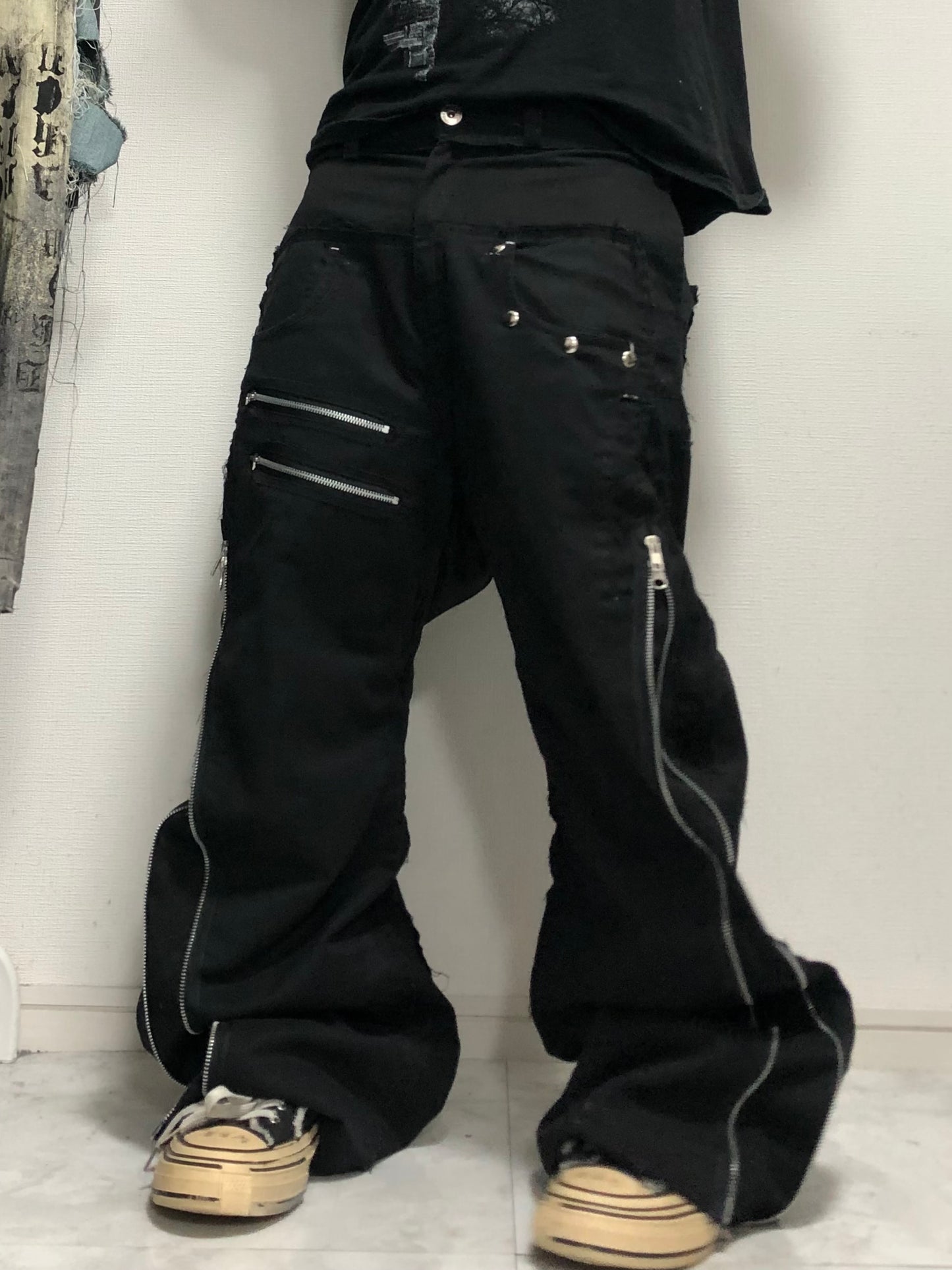 posting black denim pants